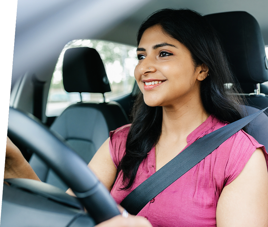 Image of a student confidently driving with Arohi Motor Driving Training School.