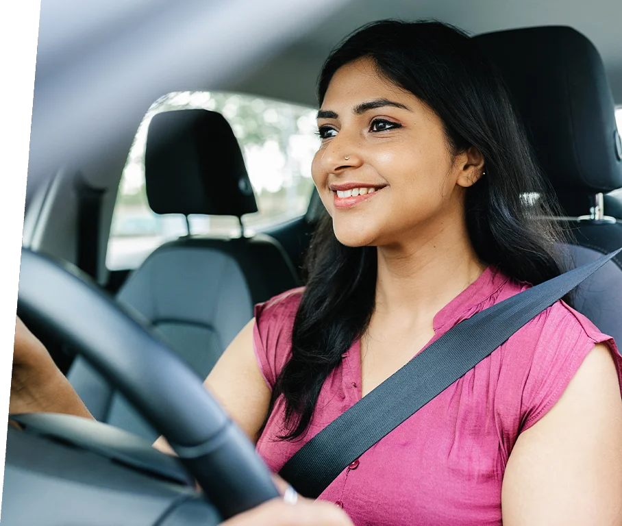 Image of a student confidently driving with Arohi Motor Driving Training School.